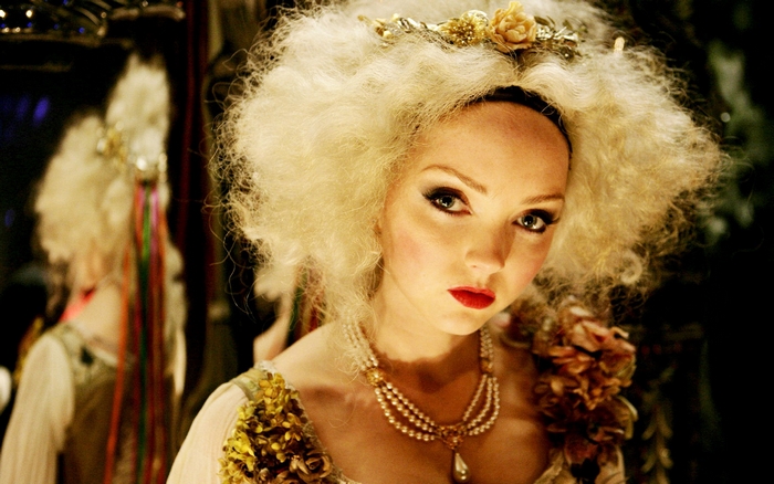 Lily Cole in elaborate costume and makeup