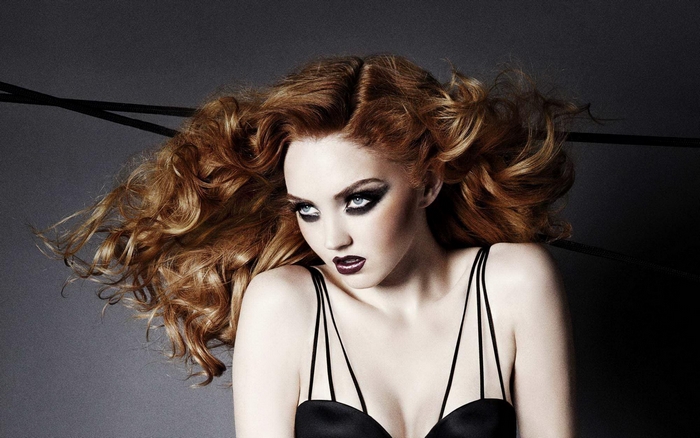 Lily Cole with dramatic makeup and hairstyle