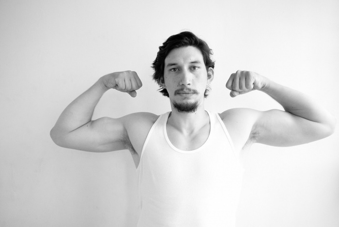 Adam Driver flexing in a tank top