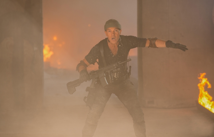 Antonio Banderas in a smoky, fiery environment