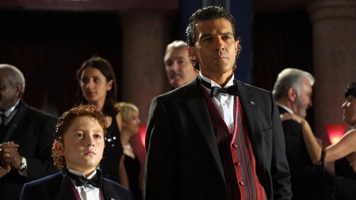 Antonio Banderas and a boy in formal wear