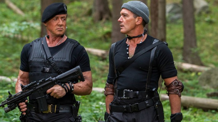 Sylvester Stallone and Antonio Banderas in a forest