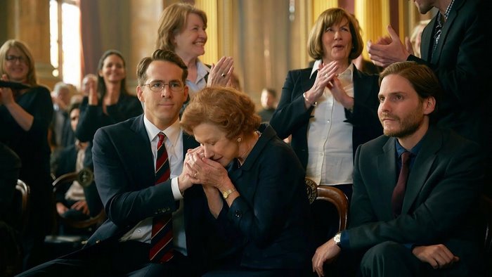 Helen Mirren and Ryan Reynolds in a formal setting