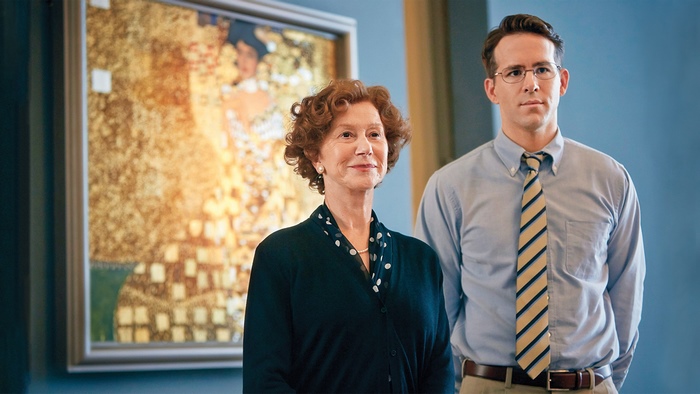 Helen Mirren and Ryan Reynolds in front of a painting