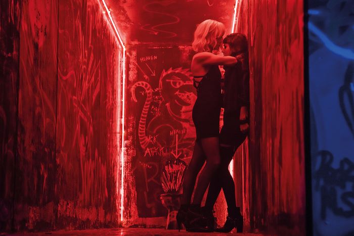 Sofia Boutella in a red-lit room