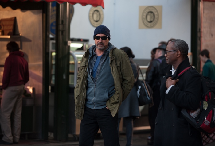 Kevin Costner in a street scene