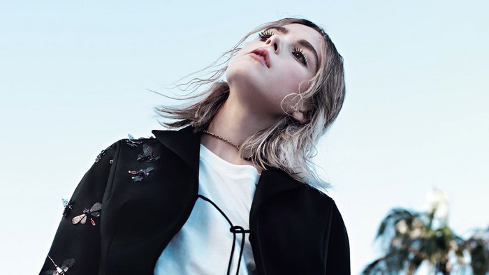 Kiernan Shipka posing outdoors