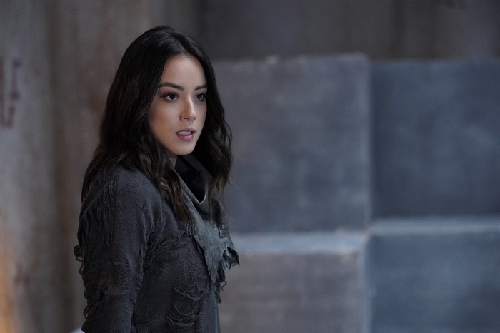 Chloe Bennet in a dark outfit