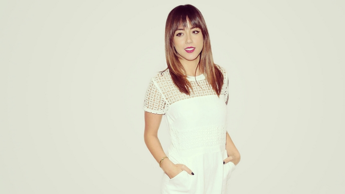 Chloe Bennet in white dress