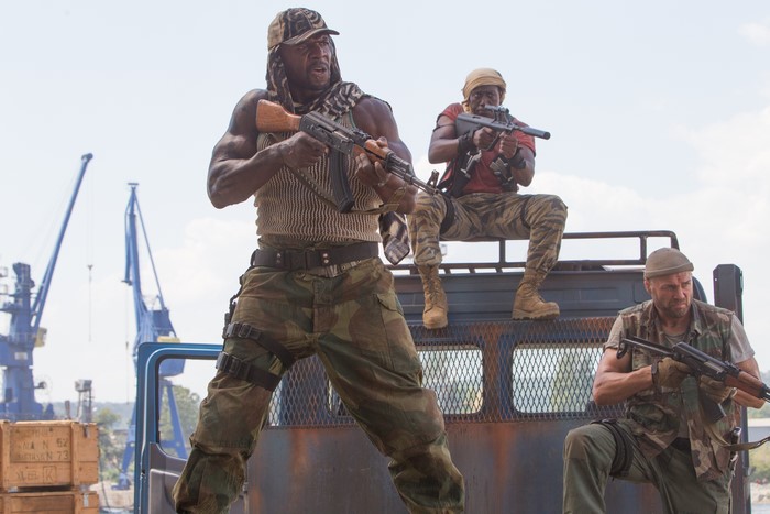 Terry Crews and two men with guns
