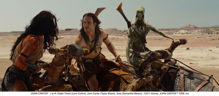 John Carter characters Dejah Thoris, John Carter, and Sola on a desert planet