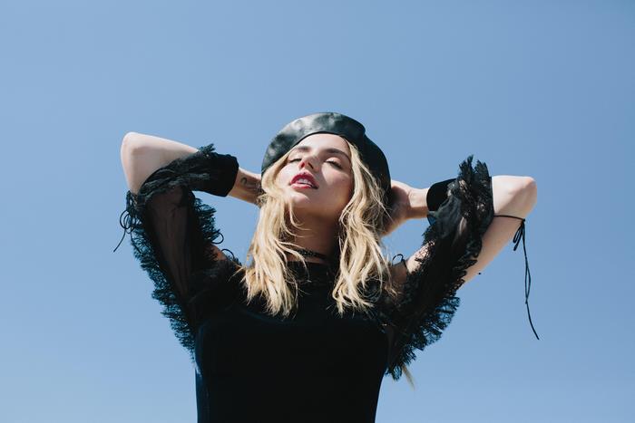 Ana de Armas in black beret and dress