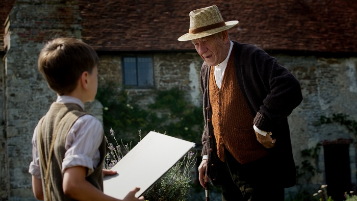 Ian McKellen and a boy with a painting