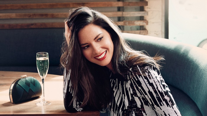 Olivia Munn with Champagne and Clutch