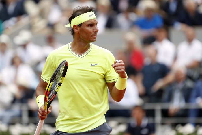 Rafael Nadal playing tennis