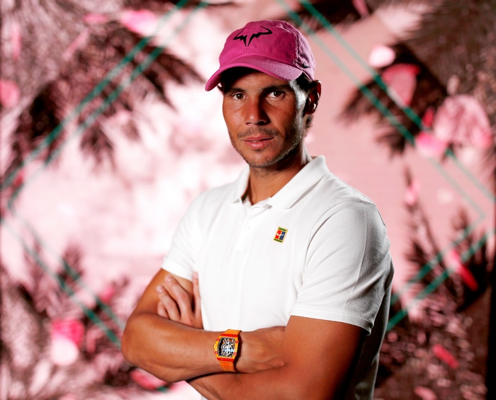 Rafael Nadal wearing a pink cap and watch