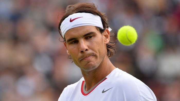 Rafael Nadal playing tennis