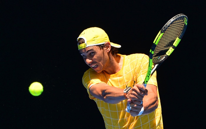 Rafael Nadal playing tennis