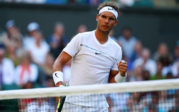 Rafael Nadal playing tennis at Wimbledon