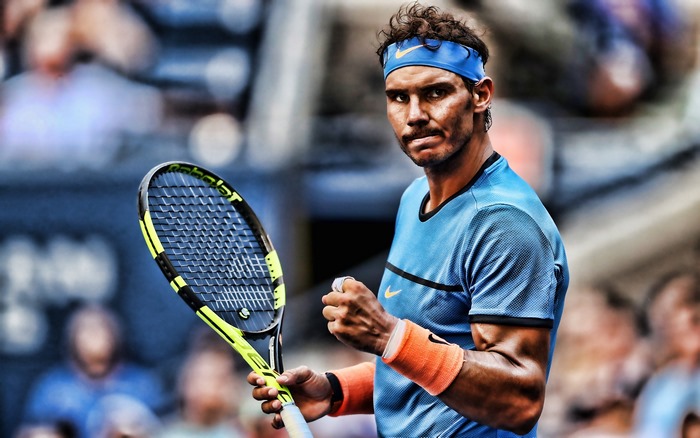 Rafael Nadal holding a tennis racket