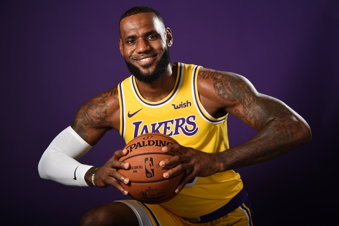 LeBron James in Lakers Jersey Holding Basketball