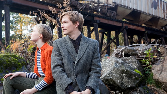 Mia Wasikowska and man by train trestle