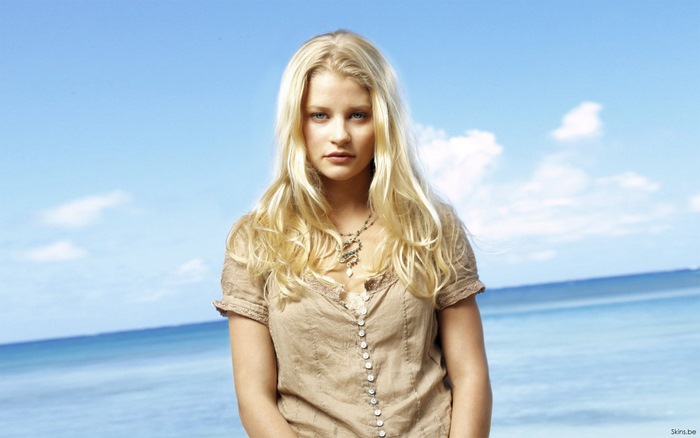 Emilie de Ravin on a beach