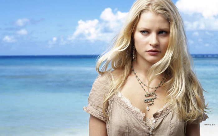 Emilie de Ravin on a beach