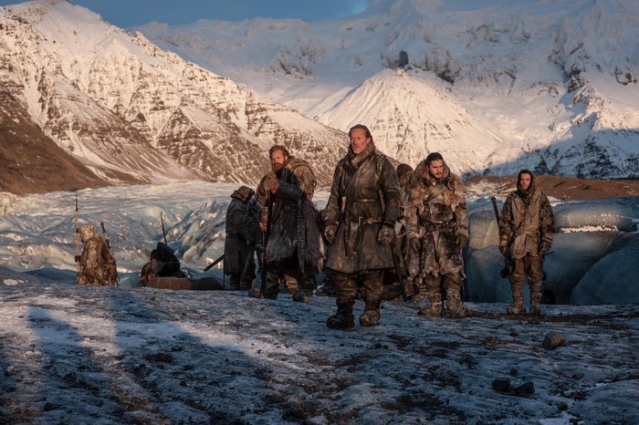 Joe Dempsie and companions on a glacier