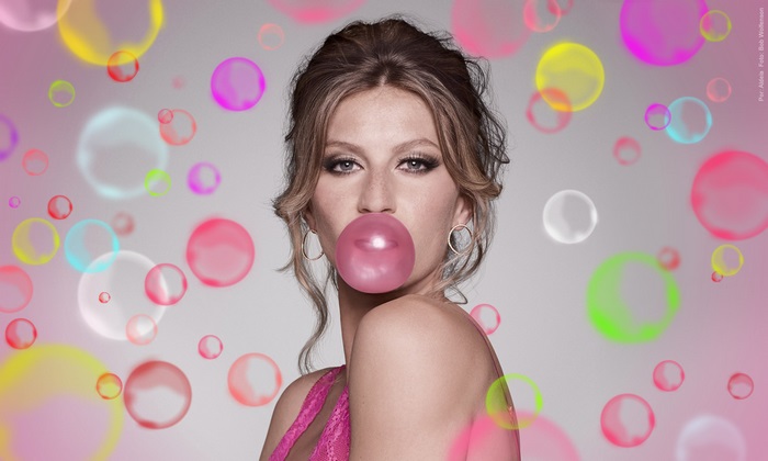 Gisele Bündchen blowing bubble gum
