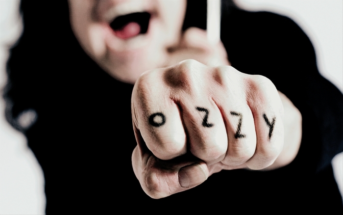 Ozzy Osbourne fist tattoo