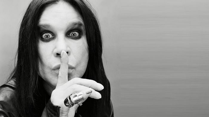 Ozzy Osbourne with finger to lips