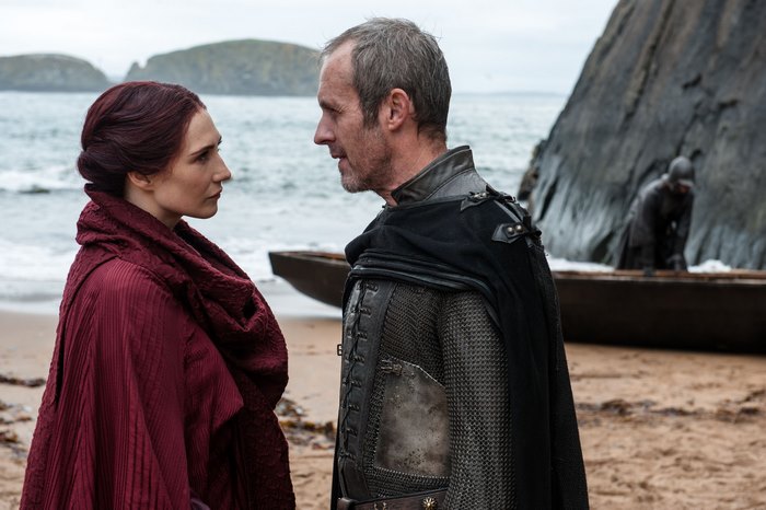 Melisandre and Stannis Baratheon on a beach