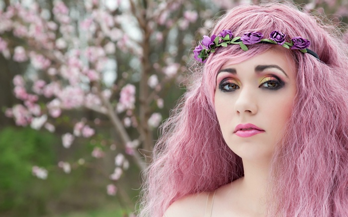 Woman with pink hair and flower crown