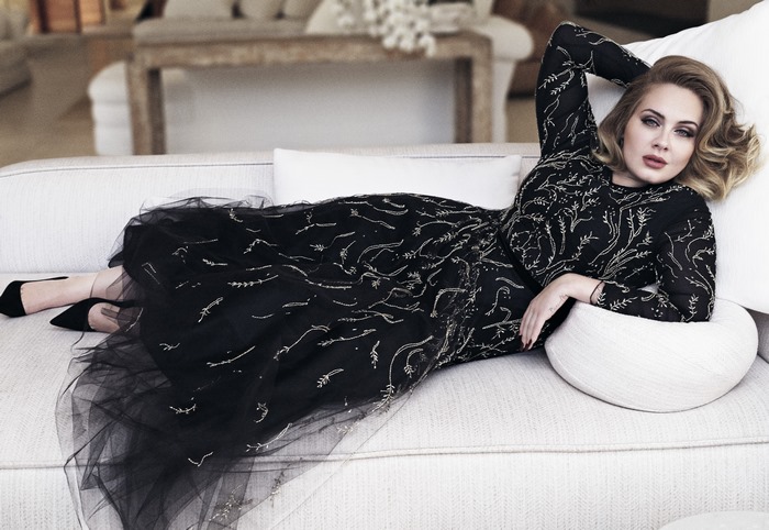 Adele in a black dress