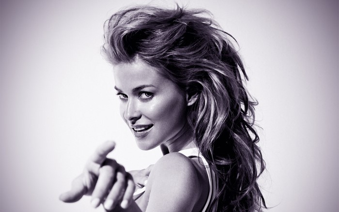 Carmen Electra pointing forward