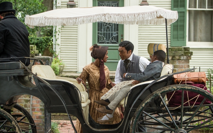 Chiwetel Ejiofor in a horse-drawn carriage