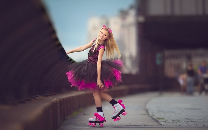 Girl in tutu and roller skates