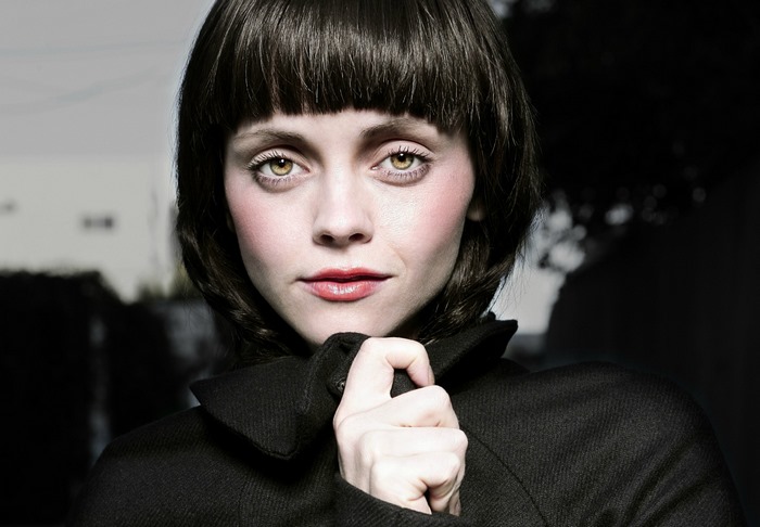 Christina Ricci in a black coat