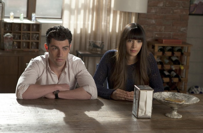 Max Greenfield and Hannah Simone at a table