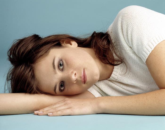 Anna Friel lying down