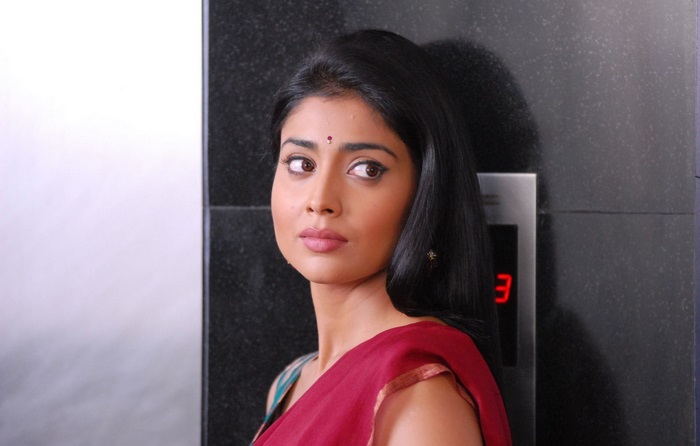 Shriya Saran in a maroon saree