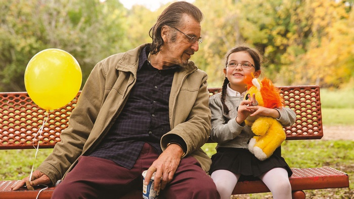 Al Pacino with a girl and a balloon