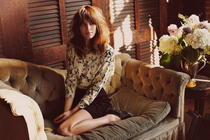Alexa Chung on a couch