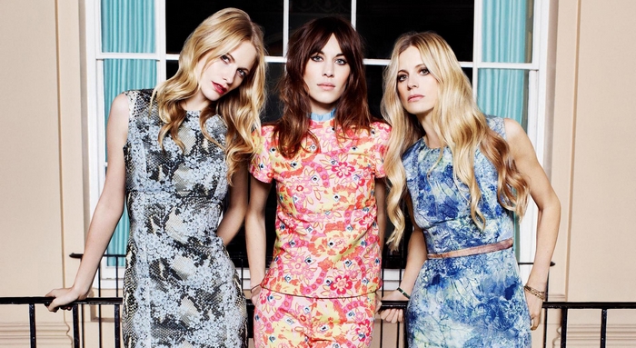 Alexa Chung and two models posing