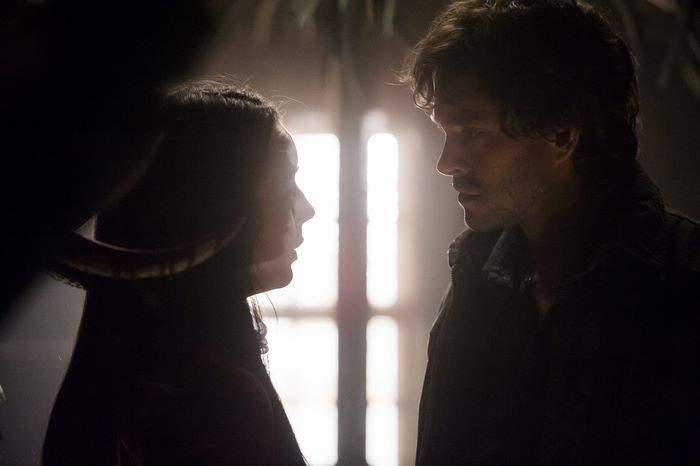 Hugh Dancy in a dimly lit scene