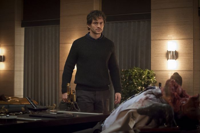Hugh Dancy in a dark sweater