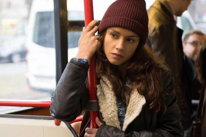 Hannah Ware on a bus