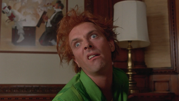 Rik Mayall with messy red hair