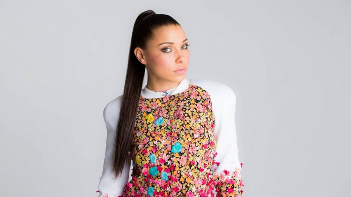 Jessica Parker Kennedy in floral jacket
